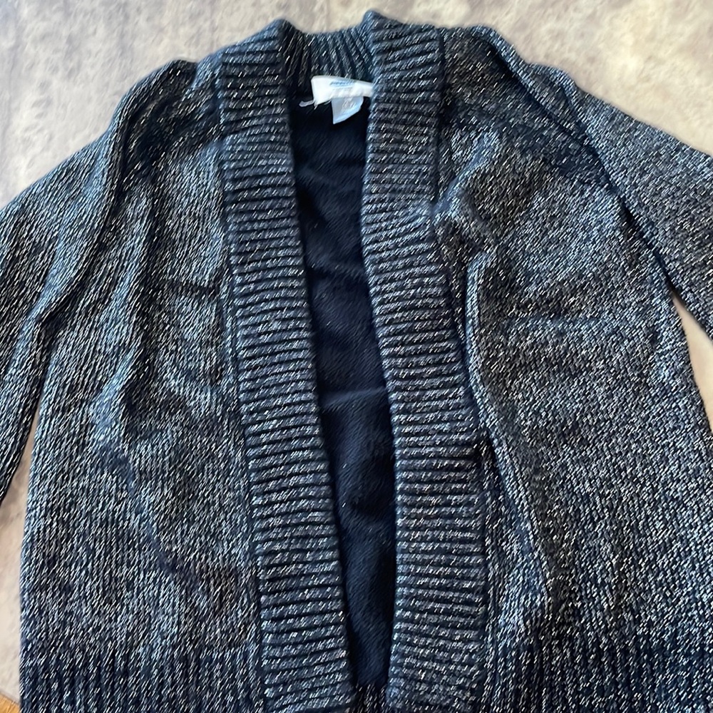 Barely worn. Black and silver glitter girls Cardigan.